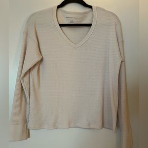 American Eagle white waist length v neck long sleeve shirt